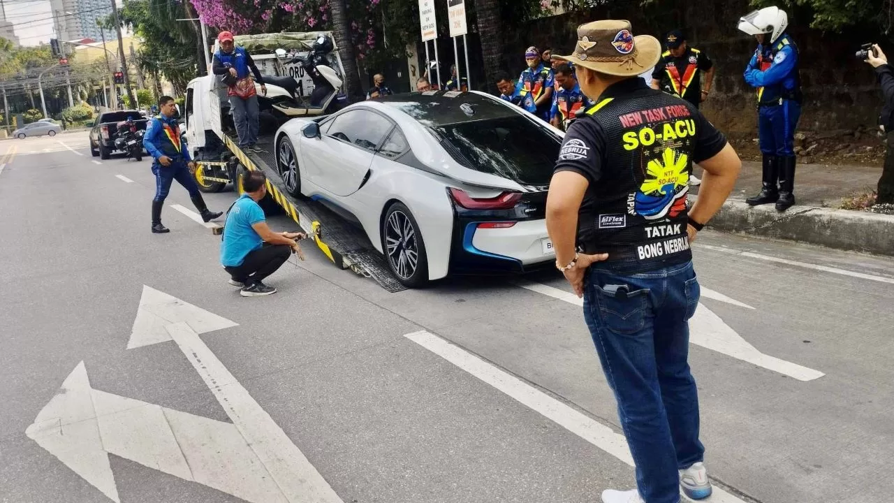 MMDA tows expensive but illegally-parked BMW i8 with expired LTO registration