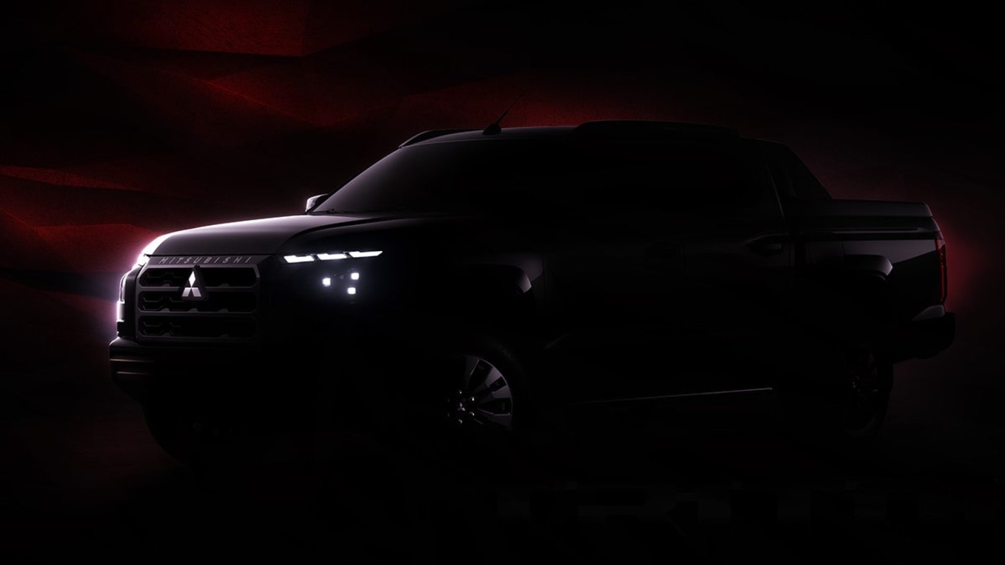 These Teaser Photos Of The 2024 Mitsubishi Strada Should Get Anyone   2024 Mitsubishi Strada Triton Teaser Main 00 Min 2048x1152 